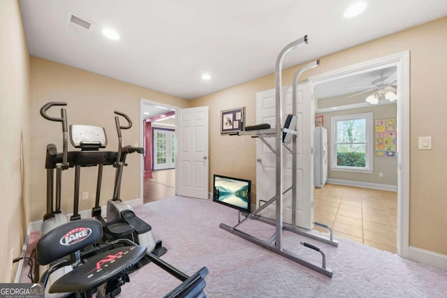 exercise room featuring tile patterned flooring, visible vents, baseboards, and recessed lighting