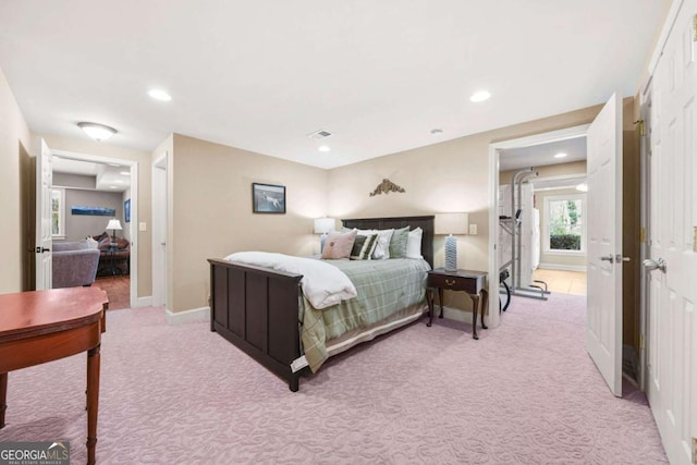 bedroom with light carpet, visible vents, baseboards, and recessed lighting