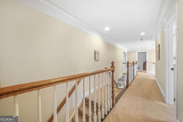 hall featuring recessed lighting, light colored carpet, ornamental molding, an upstairs landing, and baseboards