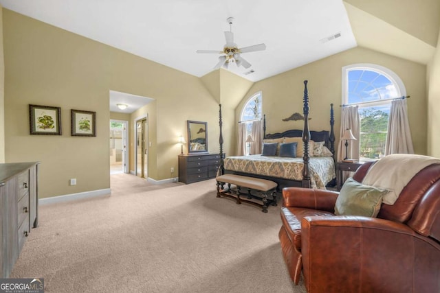 bedroom featuring lofted ceiling, multiple windows, light carpet, and visible vents