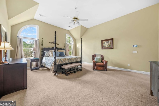 bedroom with lofted ceiling, multiple windows, visible vents, and light colored carpet