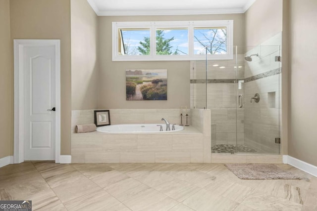 bathroom featuring ornamental molding, a shower stall, baseboards, and a bath