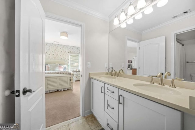 bathroom featuring double vanity, a sink, visible vents, and crown molding