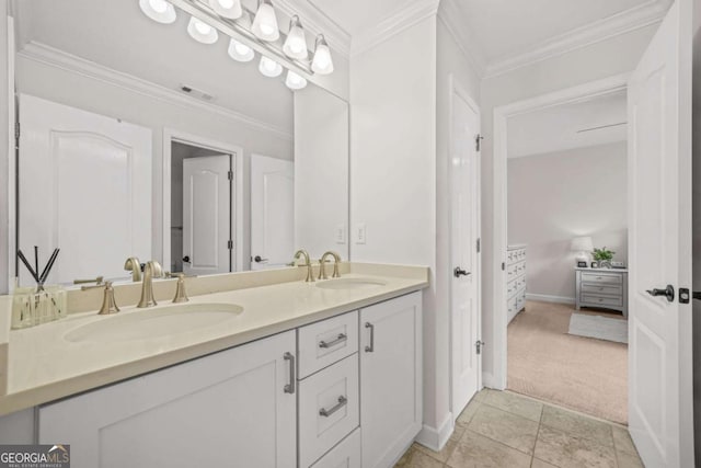 bathroom featuring double vanity, ornamental molding, a sink, and visible vents