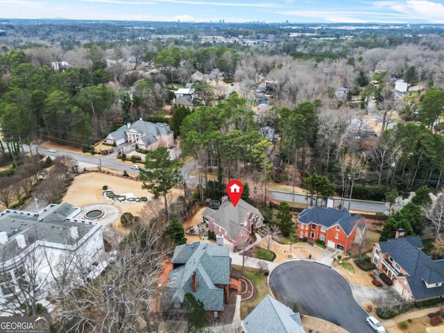 birds eye view of property with a residential view