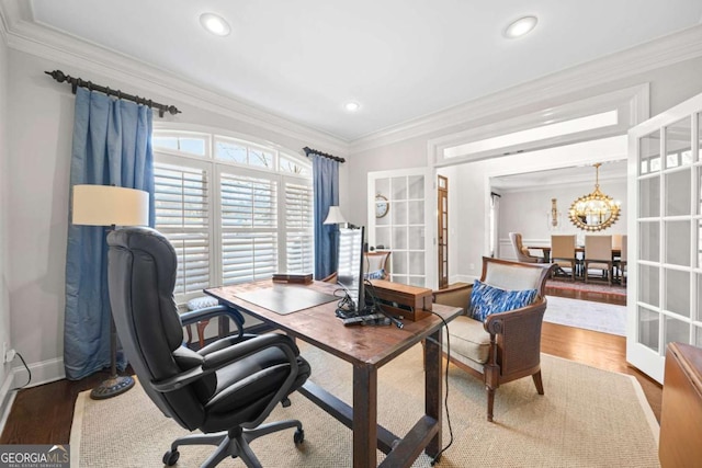 office with ornamental molding, wood finished floors, and french doors