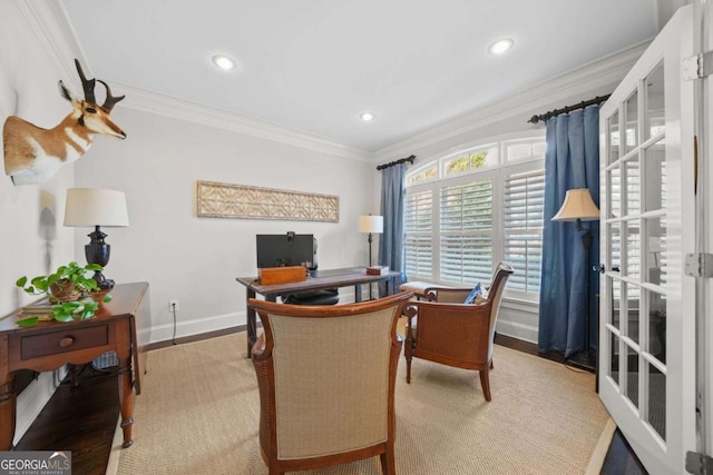 office space with light wood finished floors, baseboards, ornamental molding, and recessed lighting