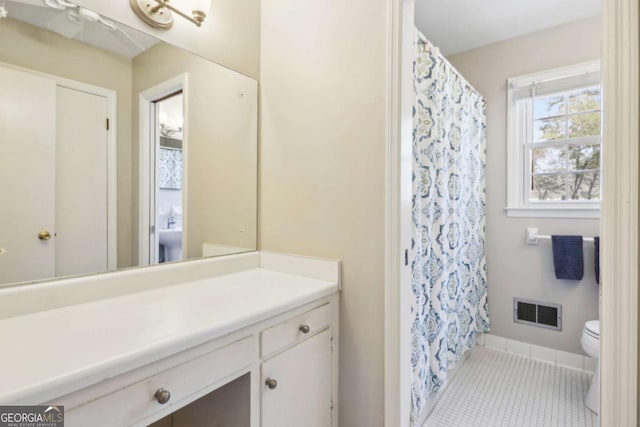 bathroom with toilet, a shower with shower curtain, vanity, visible vents, and tile patterned floors