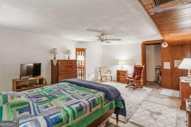 bedroom with visible vents and a ceiling fan