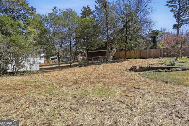 view of yard featuring fence