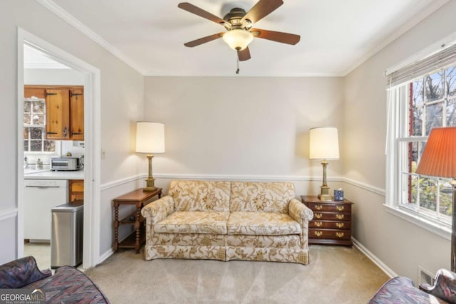 living area with light carpet, a toaster, visible vents, and ornamental molding