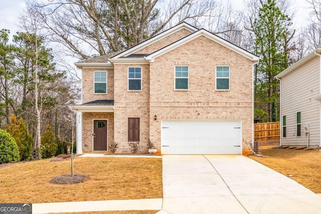 traditional-style house with brick siding, concrete driveway, a front yard, fence, and a garage