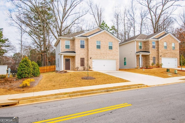 traditional home with an attached garage, driveway, fence, and brick siding