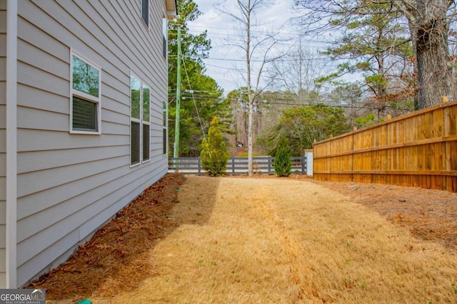 view of yard with fence