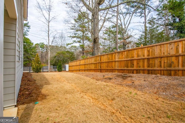 view of yard featuring fence