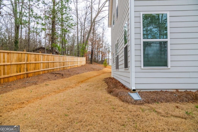 view of yard with fence