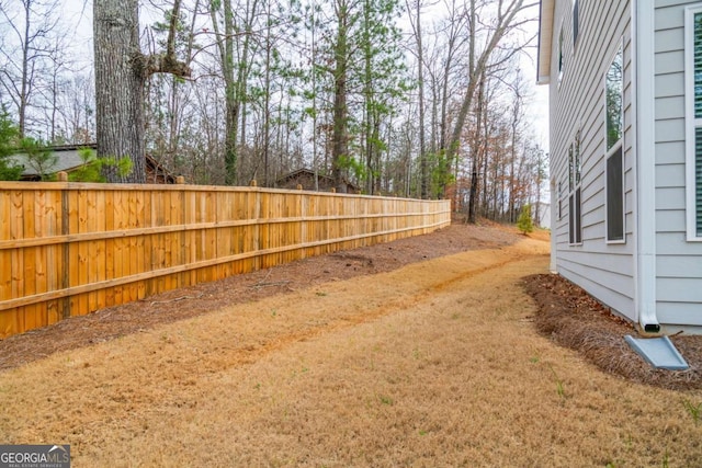 view of yard with fence