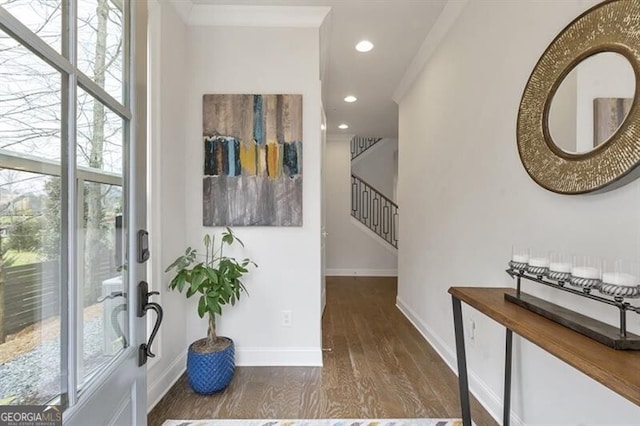 interior space featuring stairs, baseboards, wood finished floors, and recessed lighting