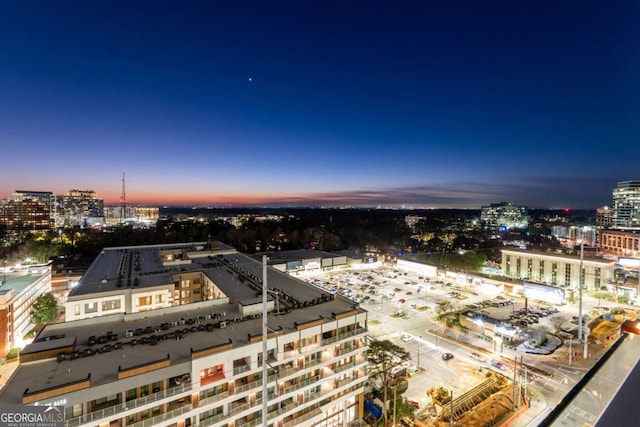 birds eye view of property featuring a view of city