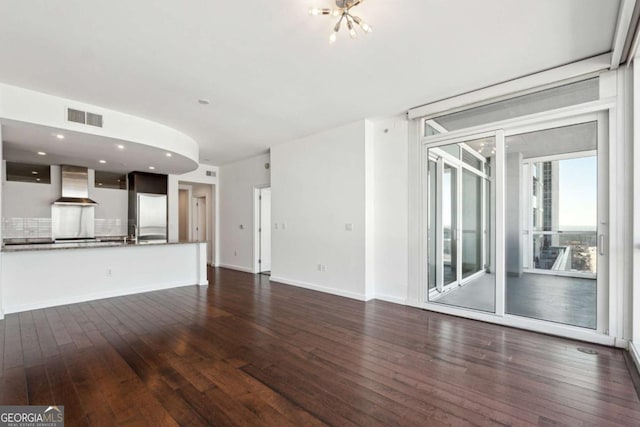 3325 Piedmont Rd NE Unit 1504, Atlanta, GA 30305 - unfurnished living room with recessed lighting, dark wood-style flooring, visible vents, and baseboards