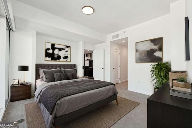 3325 Piedmont Rd NE Unit 1504, Atlanta, GA 30305 - bedroom with carpet, visible vents, and baseboards