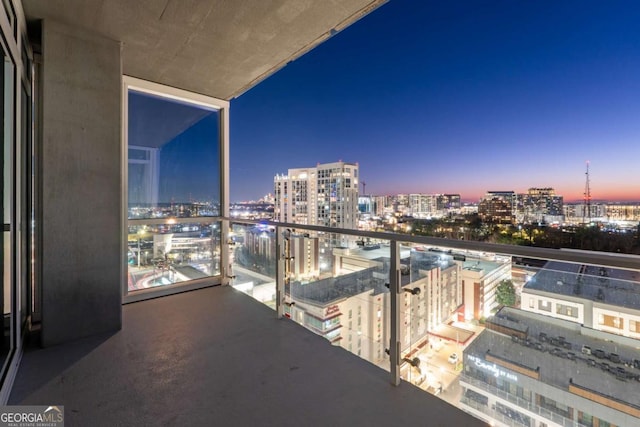 3325 Piedmont Rd NE Unit 1504, Atlanta, GA 30305 - balcony at dusk with a city view
