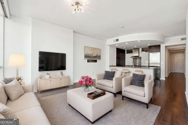 3325 Piedmont Rd NE Unit 1504, Atlanta, GA 30305 - living room with dark wood-style floors, visible vents, and baseboards