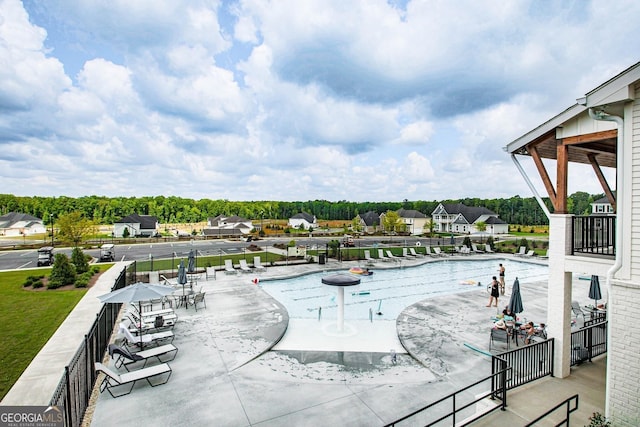 pool with a patio