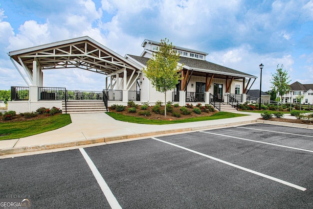 view of property with uncovered parking