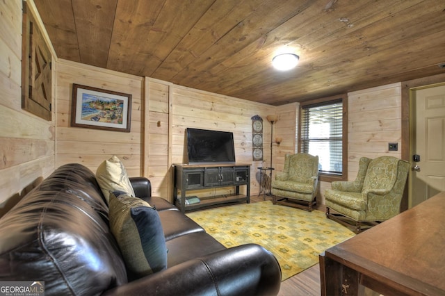 living area featuring wood ceiling, wooden walls, and wood finished floors