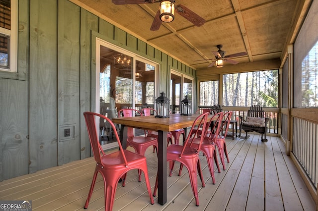 sunroom / solarium with ceiling fan and wooden ceiling