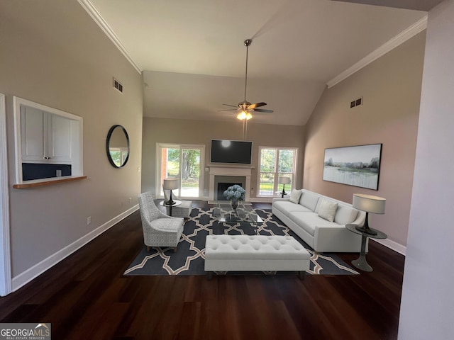 living room featuring ornamental molding, wood finished floors, and visible vents