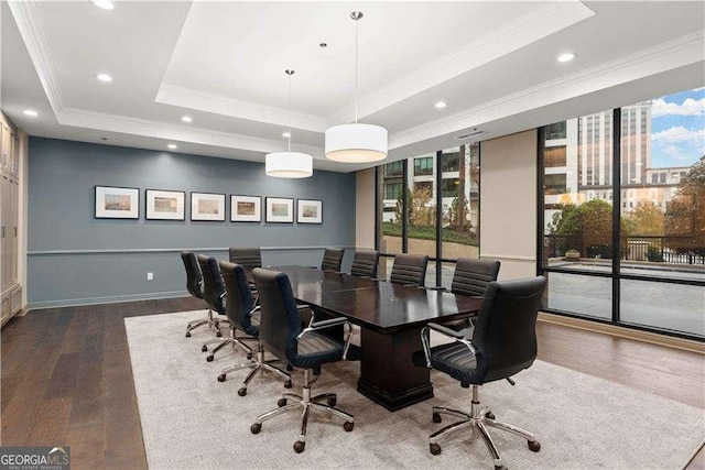 home office with ornamental molding, recessed lighting, a raised ceiling, and wood finished floors