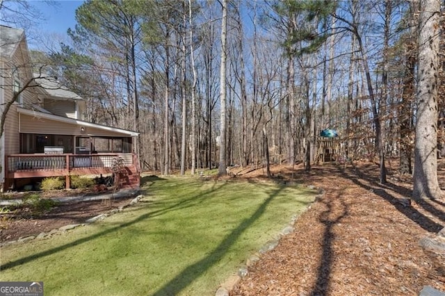 view of yard with a deck