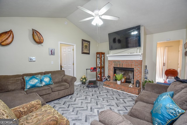 carpeted living room with lofted ceiling, a brick fireplace, a ceiling fan, and baseboards