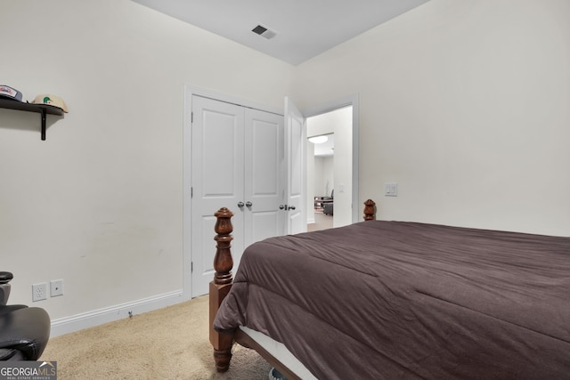 bedroom with carpet flooring, visible vents, and baseboards