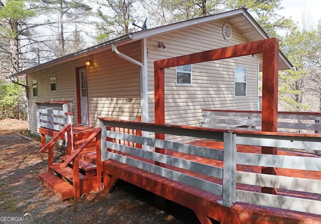 view of side of property with a garage and driveway