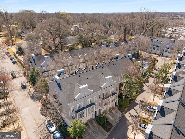 birds eye view of property with a residential view