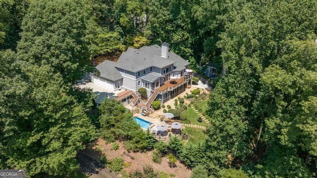 bird's eye view with a forest view