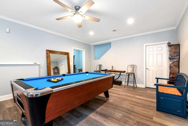 recreation room with baseboards, ornamental molding, wood finished floors, billiards, and a ceiling fan