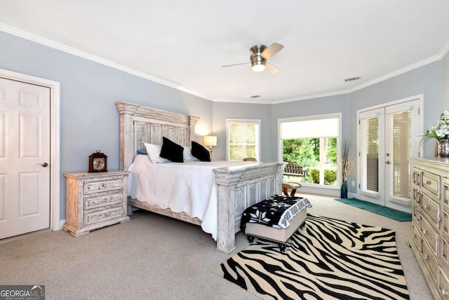 bedroom with crown molding, light colored carpet, french doors, a ceiling fan, and access to outside