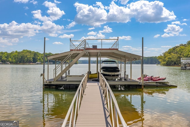 dock area featuring a water view and boat lift