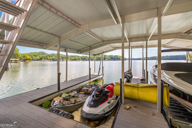dock area featuring a water view and boat lift