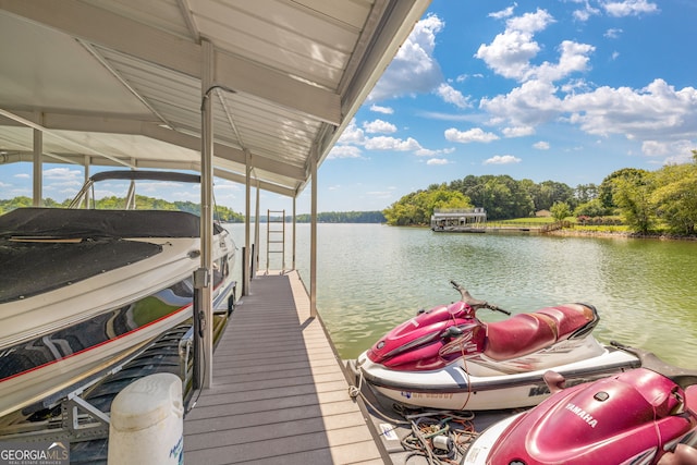 view of dock with boat lift and a water view