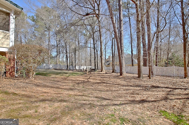 view of yard featuring fence