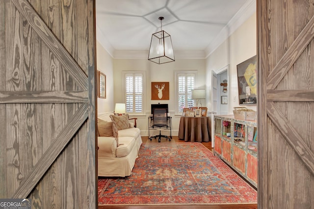 office area featuring ornamental molding and wood finished floors