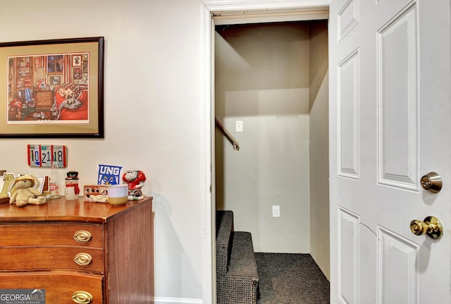 interior space with carpet and stairway