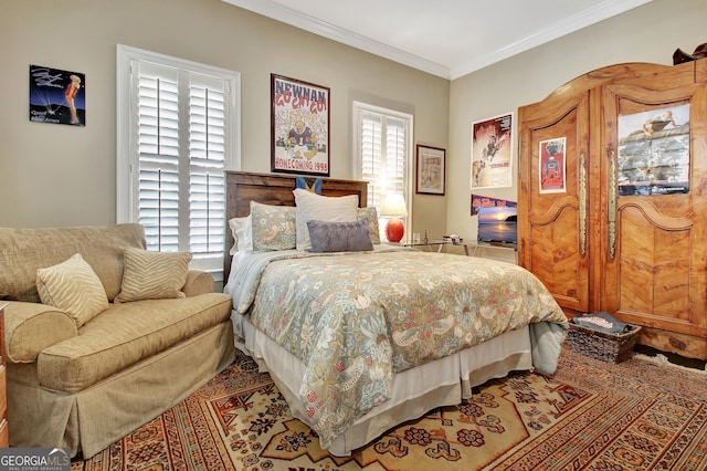 bedroom featuring crown molding