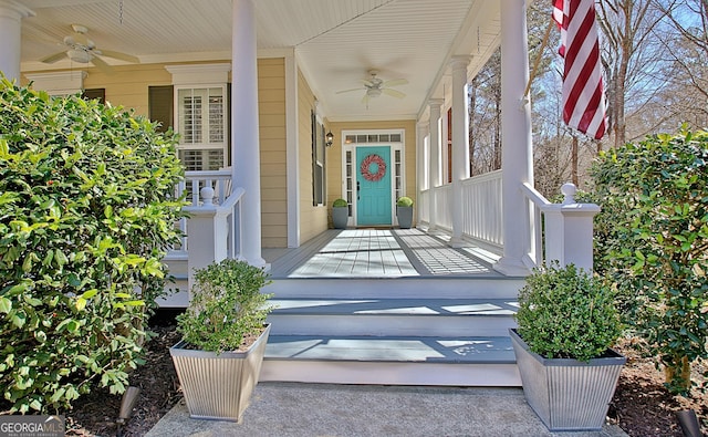 property entrance featuring covered porch and ceiling fan