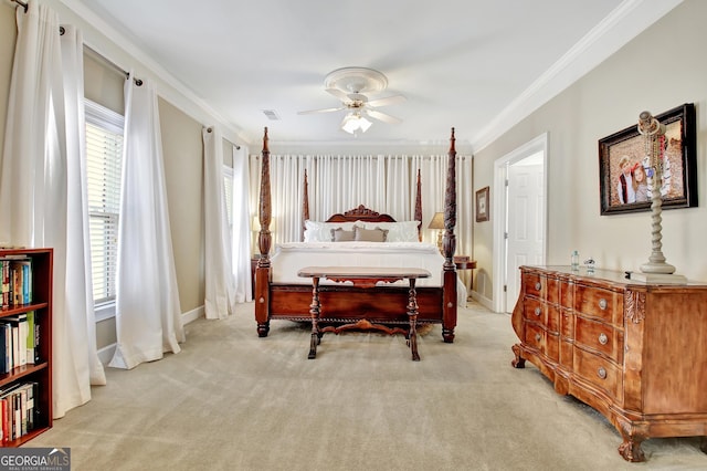 bedroom with carpet, visible vents, ornamental molding, ceiling fan, and baseboards